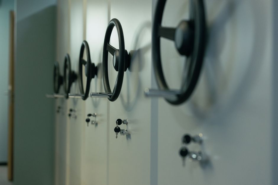 pexels-photo-8466227-8466227 Close-up of industrial safes with manual locks and keys, highlighting security features.